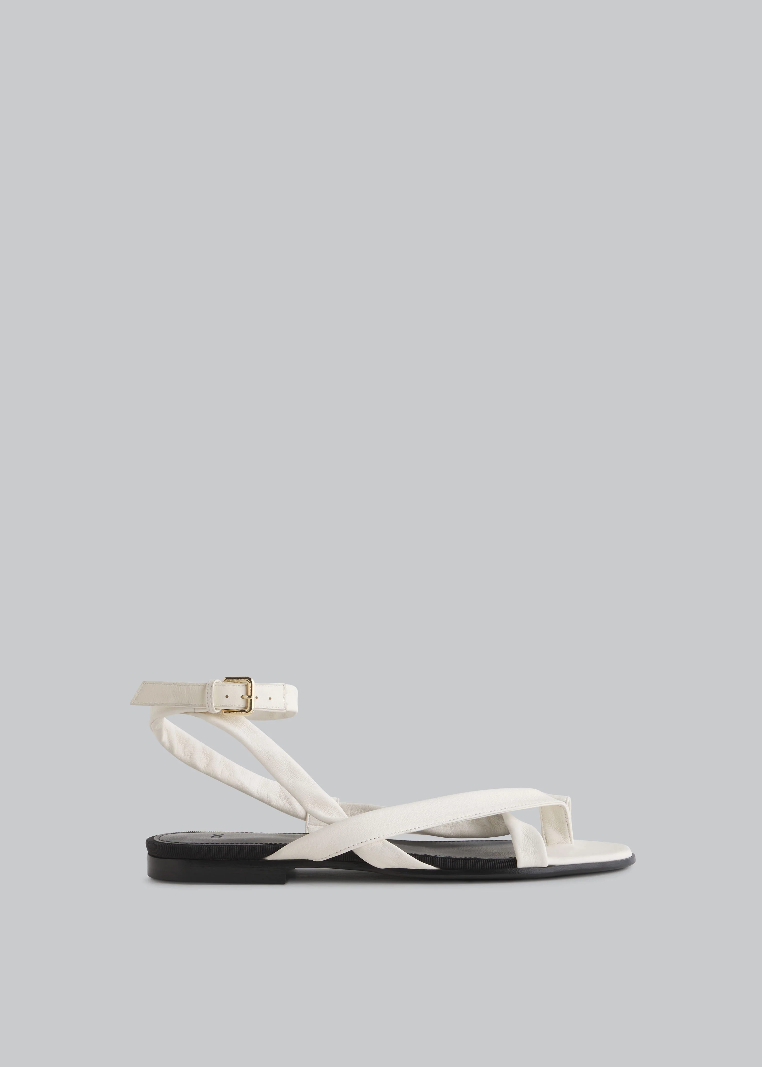 1022-stretch-leather-toe-strap-sandal-in-ivory-1.webp Stretch Leather Toe Strap Sandal in Ivory