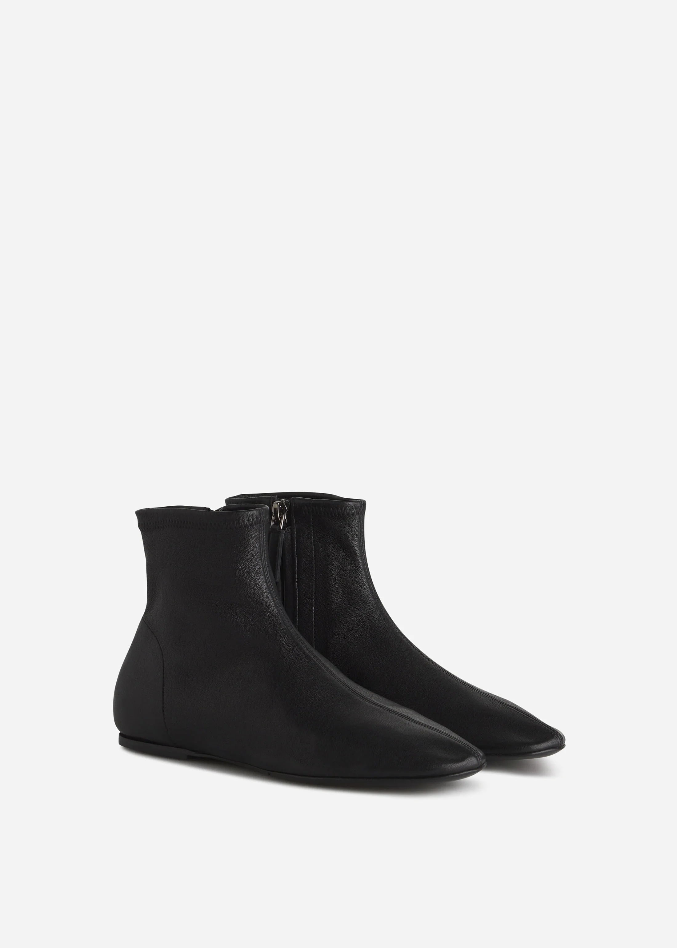 Round Toe Stretch Leather Bootie in Black